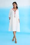 Buy_Nikasha_White Cotton Rayon Blend Printed Ribbon Collar Rose Placket Dress _at_Aza_Fashions