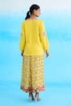 Shop_Nikasha_Yellow 100% Cotton Embroidered Ribbon Flowers Plunged V Tunic _at_Aza_Fashions