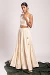 Buy_Avaha_Off White Dola Silk Placement Embellished Cowrie Shells Agni Lehenga _at_Aza_Fashions