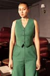 Buy_Pocketful Of Cherrie_Green 80% Polyester Solid V Neck Sculpted Hem Waistcoat _at_Aza_Fashions