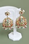 Shop_Curio Cottage_Red Kundan Pearl Embellished Jhumkas _at_Aza_Fashions