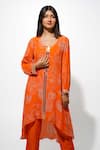 Shop_Megha Pitti_Orange Bemberg Crepe Printed Floral Round High-low Kurta With Pant _at_Aza_Fashions