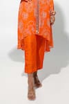 Megha Pitti_Orange Bemberg Crepe Printed Floral Round High-low Kurta With Pant _Online_at_Aza_Fashions