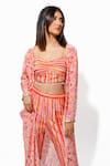 Shop_Megha Pitti_Orange Crepe And Silk Print Stripe Jacket Floral Bloom Pant Set _at_Aza_Fashions