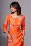 Megha Pitti_Orange Bemberg Crepe Print Floral Round Neck Blossom Cowl Dress _Online_at_Aza_Fashions