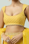 Buy_ANUSHKA KHANNA_Yellow Silk Crepe Embellished Bead Scoop Geometric Bridal Lehenga Set _Online_at_Aza_Fashions