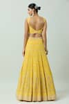 Shop_ANUSHKA KHANNA_Yellow Silk Crepe Embellished Bead Scoop Geometric Bridal Lehenga Set _at_Aza_Fashions