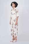 Shop_Arcvsh by Pallavi Singh_Ivory Cotton Slub Block Print Sakura Floral Lapel Jumpsuit _Online_at_Aza_Fashions