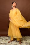 Shop KKANYAAH Yellow Silk, Cotton Embroidery, Sequins Split V-neck Pintuck Kurta Pant Set at Aza Fashions Shop_KKANYAAH_Yellow Silk, Cotton Embroidery, Sequins Split V-neck Pintuck Kurta Pant Set _at_Aza_Fashions
