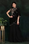 Buy_Nidhi Kejriwal_Black Crepe Hand Embroidered Jaal High Border Pre-draped Saree With Blouse _at_Aza_Fashions