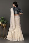 Shop_Nidhi Kejriwal_Off White Velvet Hand Embroidered Border Pre-draped Lehenga Saree With Blouse _at_Aza_Fashions