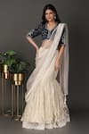 Nidhi Kejriwal_Off White Velvet Hand Embroidered Border Pre-draped Lehenga Saree With Blouse _Online_at_Aza_Fashions