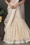 Buy_Nidhi Kejriwal_Off White Velvet Hand Embroidered Border Pre-draped Lehenga Saree With Blouse _Online_at_Aza_Fashions