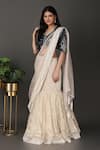 Shop_Nidhi Kejriwal_Off White Velvet Hand Embroidered Border Pre-draped Lehenga Saree With Blouse _Online_at_Aza_Fashions