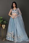 Buy Nidhi Kejriwal Blue Crepe, Organza Beads, Embroidery Asymmetric Blouse Lehenga Set at Aza Fashions Buy_Nidhi Kejriwal_Blue Crepe, Organza Beads, Embroidery Asymmetric Blouse Lehenga Set _at_Aza_Fashions