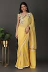 Buy_Nidhi Kejriwal_Yellow Georgette Hand Embroidered Floral Sweetheart Border Saree With Blouse _at_Aza_Fashions