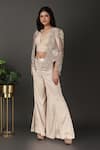 Shop_Nidhi Kejriwal_Ivory Satin Embroidered Plunging V Tissue Cutwork Cape Palazzo Set _Online_at_Aza_Fashions