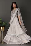 Nidhi Kejriwal_Grey Silk, Organza, Georgette Pre-draped Lehenga Saree With Peplum Blouse _Online_at_Aza_Fashions