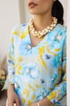 Shop_Chrkha_Blue Chanderi Silk Printed Floral V Honeycomb Embroidered Kurta Flared Pant Set_Online_at_Aza_Fashions