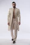 Buy Kommal Sood Beige Cotton Silk And Satin Embroidery Cutdana Moti Sherwani With Trouser at Aza Fashions Buy_Kommal Sood_Beige Cotton Silk And Satin Embroidery Cutdana Moti Sherwani With Trouser _at_Aza_Fashions