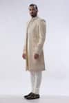 Kommal Sood Beige Cotton Silk And Chanderi Cutdana Moti Sherwani Churidar Set at Aza Fashions Kommal Sood_Beige Cotton Silk And Chanderi Cutdana Moti Sherwani Churidar Set _at_Aza_Fashions