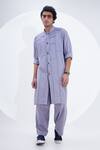 Buy_Jajaabor_Blue Linen Overlocked Panelled Kurta And Pant Set_at_Aza_Fashions