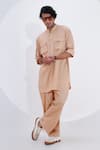 Buy_Jajaabor_Beige Linen Embroidered Threadwork Tiger Placement Kurta With Pant_at_Aza_Fashions