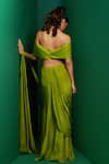 Shop_K&A By Karishma and Ashita_Green Crepe Plain Off Slit Pre-draped Saree With Bow-neck Blouse _at_Aza_Fashions