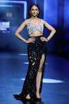 Ritika Mirchandani_Black Net Embroidery Crystal Cutwork Floral Bustier And Slit Skirt Set  _Online_at_Aza_Fashions