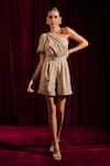 Buy_tara and i_Beige Faux Leather One Shoulder Mesh Bow Embellished Playsuit _at_Aza_Fashions