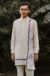 Vaani Beswal_Ivory Handloom Cotton Embroidered Cutwork Aridian Kantha Kurta_Online_at_Aza_Fashions