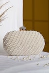 Buy_House of Webhin_White Pearls Opulence Oval Embellished Clutch With Detachable Sling Chain _at_Aza_Fashions