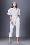 Buy_Deepika Arora_White Ponte Roma Embroidery Floral Applique Ruffle Jumpsuit _at_Aza_Fashions