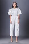 Deepika Arora_White Ponte Roma Embroidery Floral Applique Ruffle Jumpsuit _Online_at_Aza_Fashions