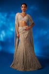 Buy_Charu and Vasundhara_Gold Skirt Net Embroidered Mother Of Pearl Leaf Valaria Cape Lehenga Set_at_Aza_Fashions