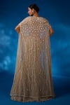 Shop_Charu and Vasundhara_Gold Skirt Net Embroidered Mother Of Pearl Leaf Valaria Cape Lehenga Set_at_Aza_Fashions