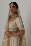 Shop_Rhua India_Off White Blouse  Lehenga Banarasi Brocade Sunehri Bloom Crest Set_Online_at_Aza_Fashions