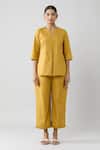 Naintara Bajaj Yellow Cotton Open Neck Solid Top And Pleated Hem Pant Co-ord Set Online at Aza Fashions Naintara Bajaj_Yellow Cotton Open Neck Solid Top And Pleated Hem Pant Co-ord Set _Online_at_Aza_Fashions