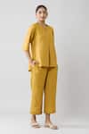 Buy Naintara Bajaj Yellow Cotton Open Neck Solid Top And Pleated Hem Pant Co-ord Set Online at Aza Fashions Buy_Naintara Bajaj_Yellow Cotton Open Neck Solid Top And Pleated Hem Pant Co-ord Set _Online_at_Aza_Fashions