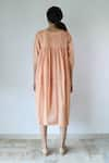 Shop_Merakus_Peach Cotton Plain Round Neck Pleated Yoke Dress  _at_Aza_Fashions