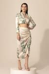 Sakshi Girri_Ivory Stretch Satin Printed Botanical Shawl Lapel Blazer And Skirt Set  _at_Aza_Fashions