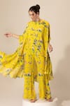 Buy_Sakshi Girri_Yellow Crepe Printed Botanical Round Cape And Bell Bottom Pant Set _at_Aza_Fashions