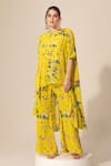 Shop_Sakshi Girri_Yellow Crepe Printed Botanical Round Cape And Bell Bottom Pant Set  _Online_at_Aza_Fashions