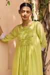 Shop_Surmaye_Green Handwoven Blossom Embellished Smocked Yoke Kurta With Pant  _Online_at_Aza_Fashions