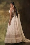 Shop_Archana Kochhar_Ivory Net Embroidered Pearls Deep V Neck Floral And Lehenga Set _at_Aza_Fashions