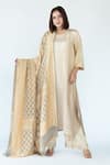 Buy_Meghna Panchmatia_Ivory Pure Silk Woven Bandhej Asymmetric Kurta With Zari Dupatta _at_Aza_Fashions