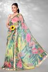 Buy_Anita Kanwal_Yellow Georgette Printed Floral Saree With Unstitched Blouse Piece _at_Aza_Fashions