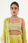 Rishi and Vibhuti_Green Crepe Embroidered Sequin Bustier Aelin Cape With Draped Skirt Set _Online_at_Aza_Fashions