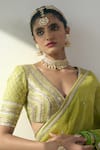 Rishi and Vibhuti_Green Chanderi Embroidered Lace V Neck Elyse Sequin Saree With Blouse _at_Aza_Fashions