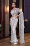 Shop_Mehul Gupta_Silver Net Hand Embroidery Sequins Asymmetric Neck Blouse With Skirt_at_Aza_Fashions